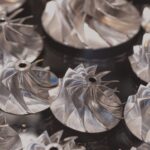 Investment casting vs sand casting comparison showing surface finish difference between precision investment cast and sand cast component