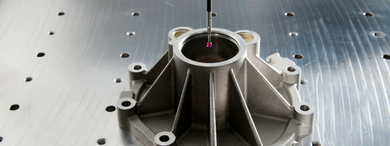 Casting inspection methods — CMM coordinate measuring machine inspecting aerospace precision investment casting at Uni Tritech quality laboratory